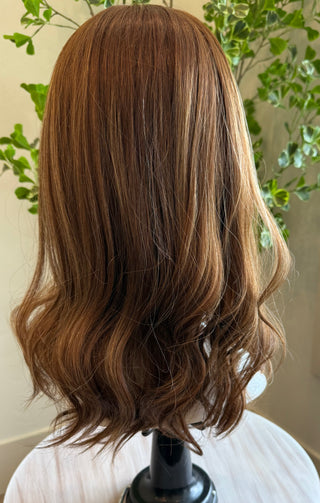 Alternate lighting to show coloring of hand tied European wig 