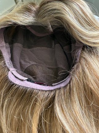 Inside view of wig cap with hand tied and monofilament top and lace front 