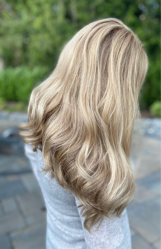 Side view of blond Slavic virgin wig 