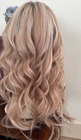Back view of multi dimensional warm blonde 