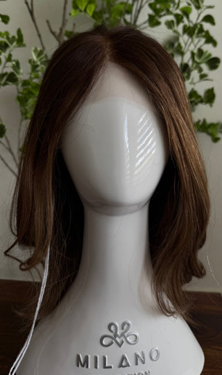 Front view of natural brunette wig in natural light 