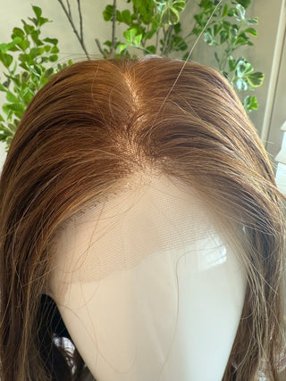View of front hairline and small knots 