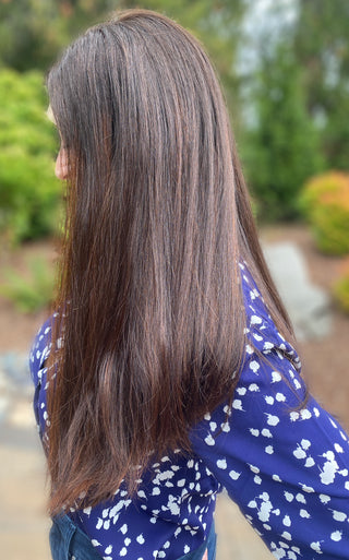 Side profile view of human hair wig long brown with balayage 