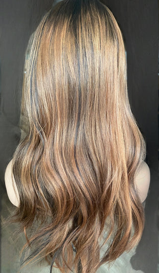 back view of dimensional brunette with red tones custom colored and layered 